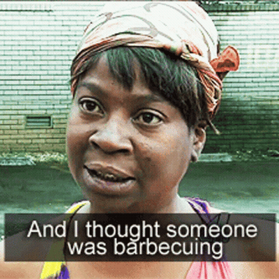 Woman With Scarf Saying I Thought Someone Was Barbecuing GIF