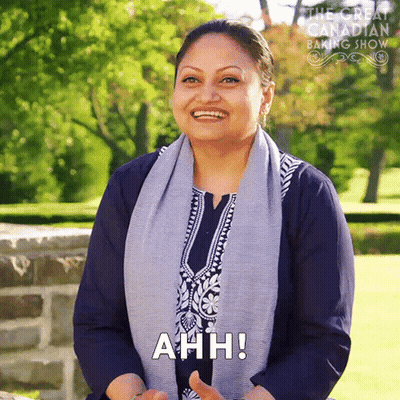 Woman With Scarf Smiling Saying Ahh GIF