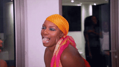 Woman With Scarf Sticking Out Tongue GIF