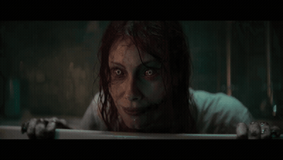 Woman With Scary Face Looking Out Window GIF