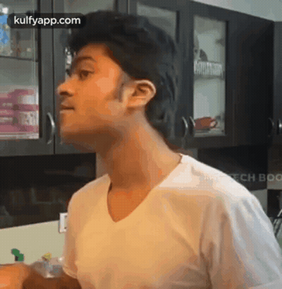 Woman With Shaved Head Crying In Bathroom GIF