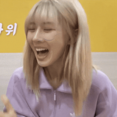 Woman With Shaved Head In Vogue Top GIF