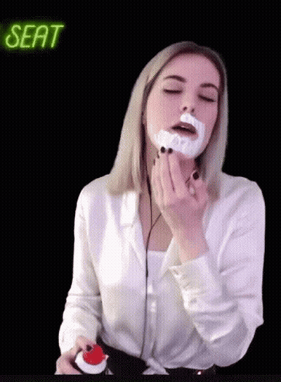 Woman With Shaving Cream On Face And Seat Neon Sign GIF