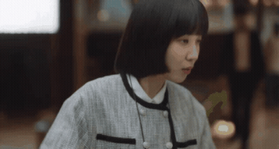 Woman With Short Black Hair In White Shirt GIF