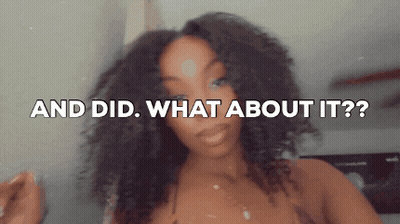 Woman With Short Black Hair Making Funny Face Saying And Do GIF