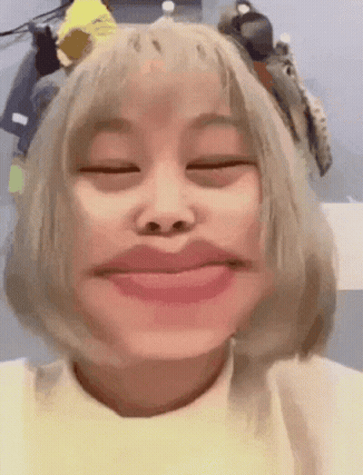 Woman With Short Blonde Hair Making Funny Face GIF