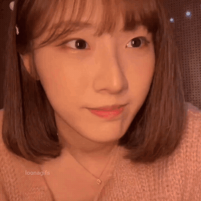 Woman With Short Hair And Necklace GIF