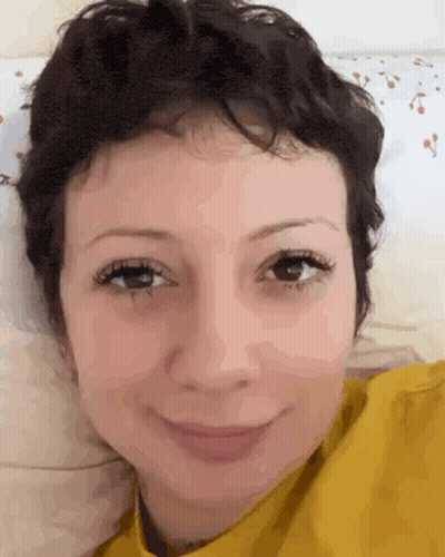 Woman With Short Hair And Yellow Shirt GIF