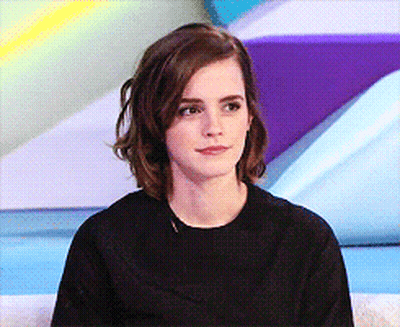 Woman With Short Hair In Black Top GIF