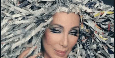 Woman With Shredded Newspaper Hair GIF