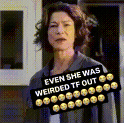 Woman With Sign Saying Even She Was Weirded TF Out GIF