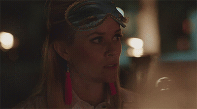 Woman With Sleep Mask Biting Finger GIF