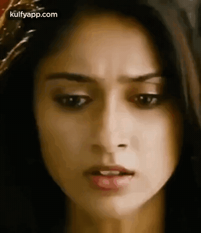 Woman With Slight Smile GIF