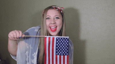 Woman With Small American Flag GIF