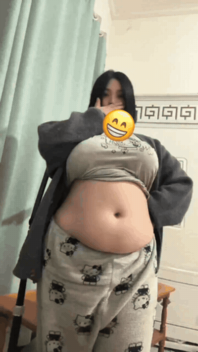 Woman With Smiley Face Showing Belly GIF