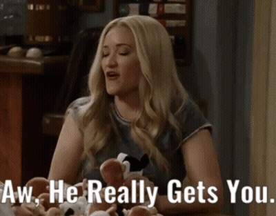Woman With Stuffed Animals Says Aw He Really Gets You GIF