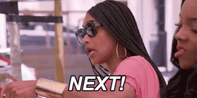 Woman With Sunglasses And Pink Shirt Beside Another Saying Next GIF