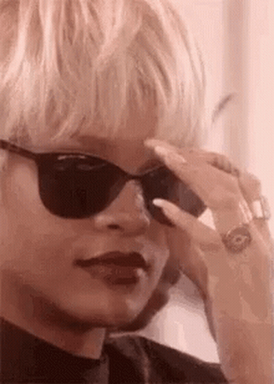 Woman With Sunglasses And Ring GIF