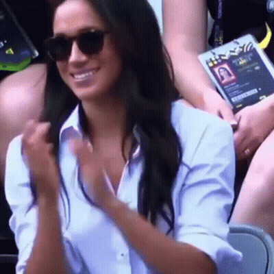 Woman With Sunglasses And White Shirt Smiling Clapping GIF
