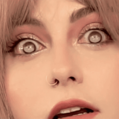 Woman With Surprised Expression And Nose Ring GIF