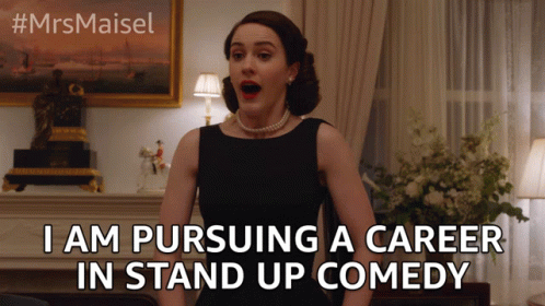Woman With Surprised Look Pursuing Career In Stand Up Comedy GIF