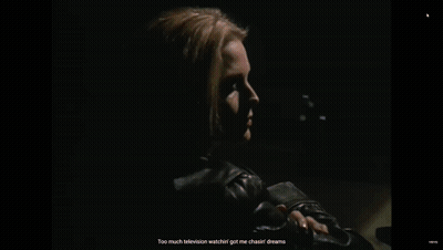 Woman With Tan And Gleam In Eye GIF