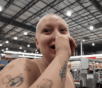 Woman With Tattoo Saying A GIF