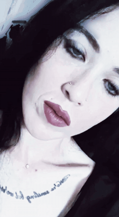 Woman With Tattoo Saying Now I'll Proclaim My Love GIF