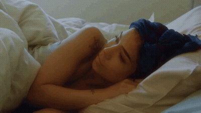 Woman With Tattoo Sleeping GIF