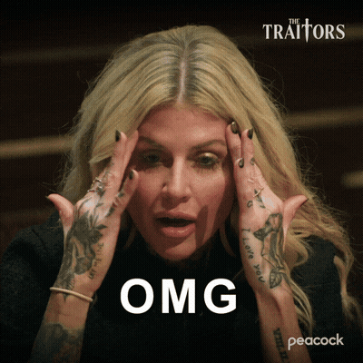 Woman With Tattooed Hands Holding Head Saying Omg GIF