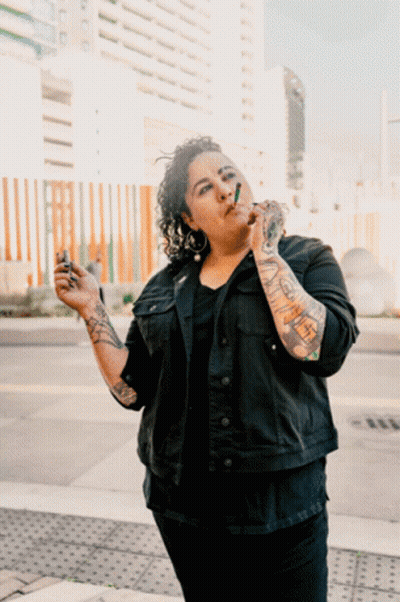 Woman With Tattoos Smoking GIF
