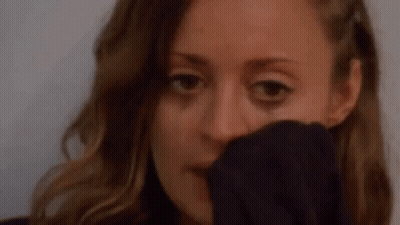 Woman With Tear Covering Face GIF