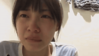 Woman With Tear Running Down Her Cheek GIF