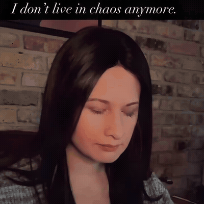 Woman With Text I Don't Live In Chaos Anymore GIF