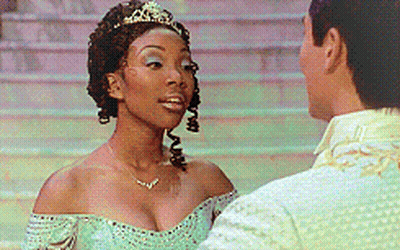 Woman With Tiara Next To Man In Suit GIF