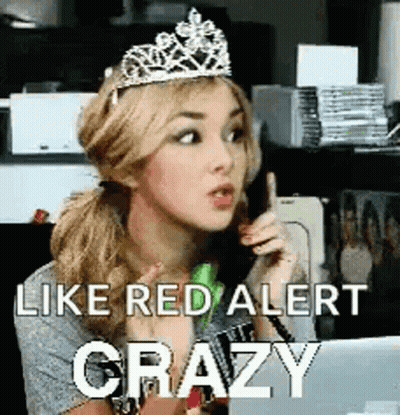 Woman With Tiara Sitting At Laptop GIF