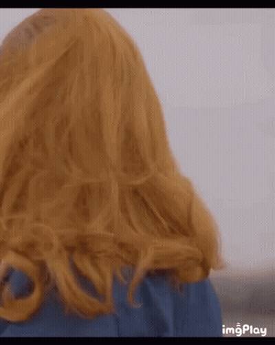 Woman With Tiara Sitting At Laptop GIF