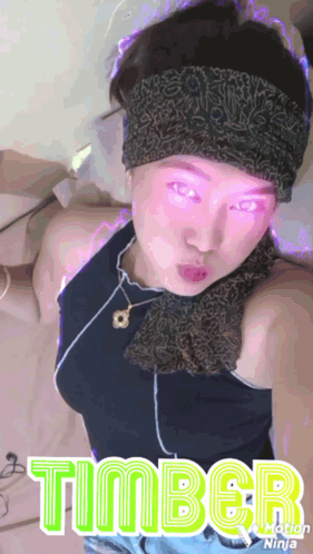 Woman With Timber Written On Face GIF