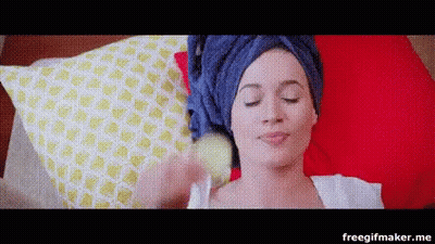 Woman With Towel On Head Laying In Bed GIF