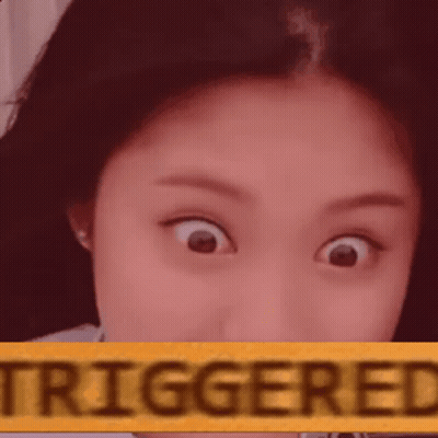 Woman With Triggered Sign
