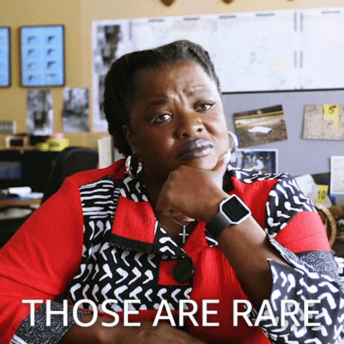 Woman With Watch By Sign Those Are Rare GIF