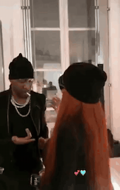 Woman With Watch Shakes Hands With Man GIF