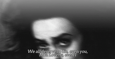 Woman With We All Deserve To Die Text GIF
