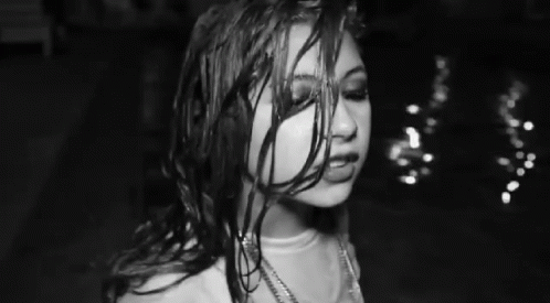 Woman With Wet Hair And Necklace GIF