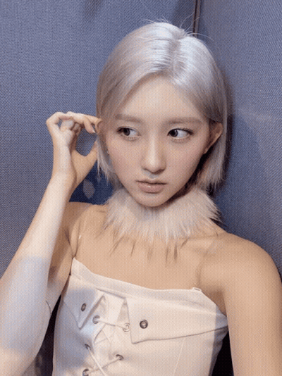 Woman With White Hair And Fur Collar GIF