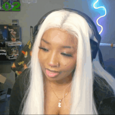 Woman With White Hair Wearing Headphones And Necklace GIF