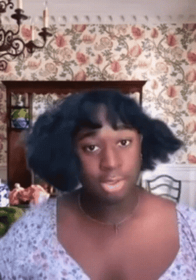 Woman With Wig Making Funny Face GIF