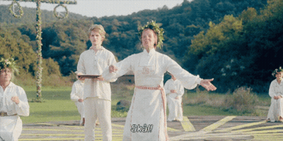 Woman With Wreath Dancing Says Skal GIF
