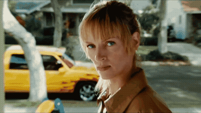 Woman With Yellow Car Behind GIF