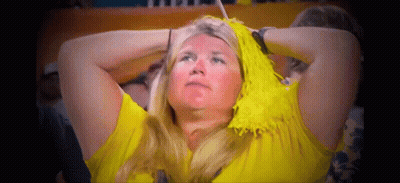 Woman With Yellow Pom Poms Watching Game GIF
